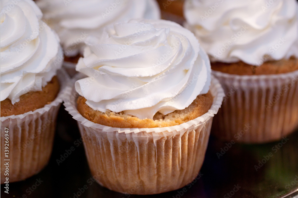 several cakes basket with whipped cream several cakes basket with whipped cream