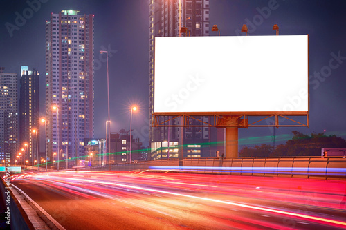 blank billboard in night city photo