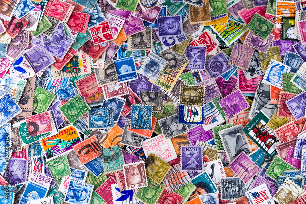 A Collection of used US Postage Stamps off paper