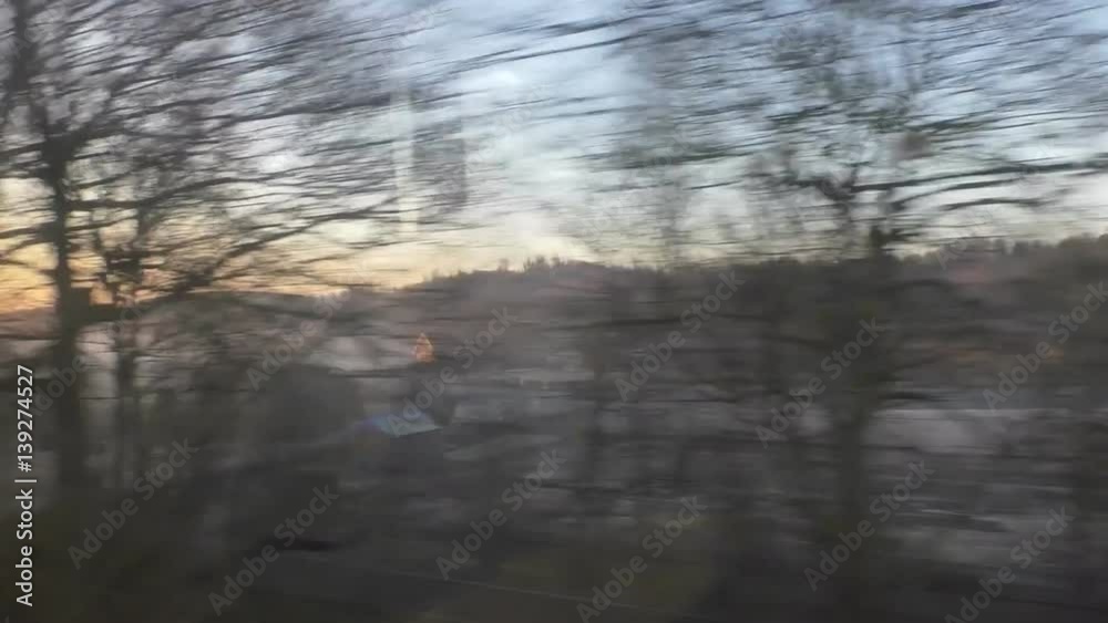 Morning frost view at dawn in rural England from moving train Morning frost view at dawn in rural England from moving train