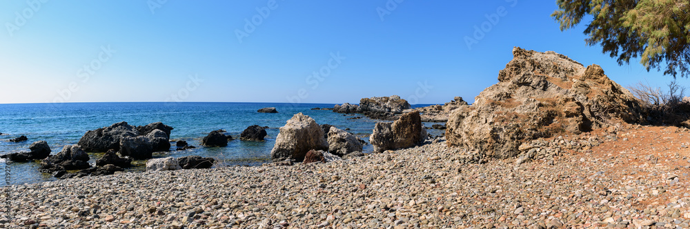 Rocky coastline with turquoise lagoon near Paleochora town on Crete island, Greece