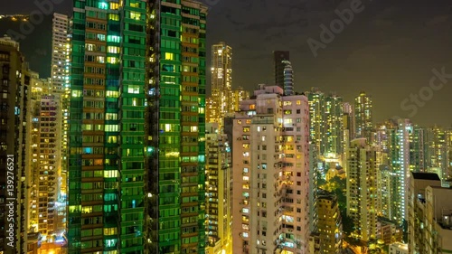 hong kong city night light apartment buildings rooftop panorama 4k time lapse china
 photo