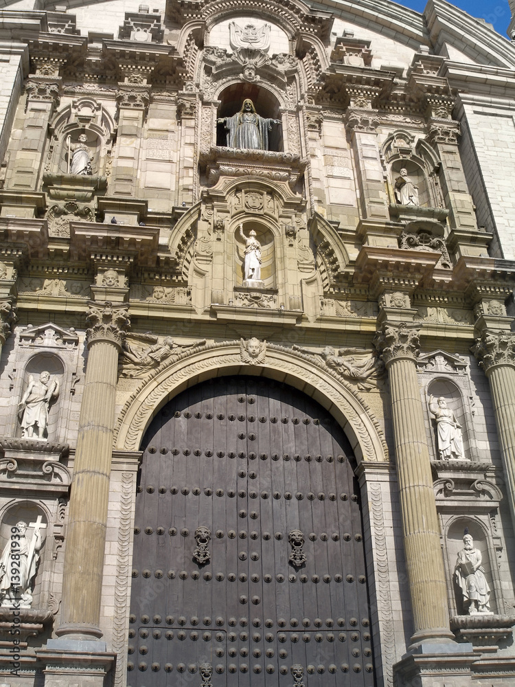 Lima. Peru. Stonework adorning entrance to the Basilica Cathedral of Lima constructed in 1535.
