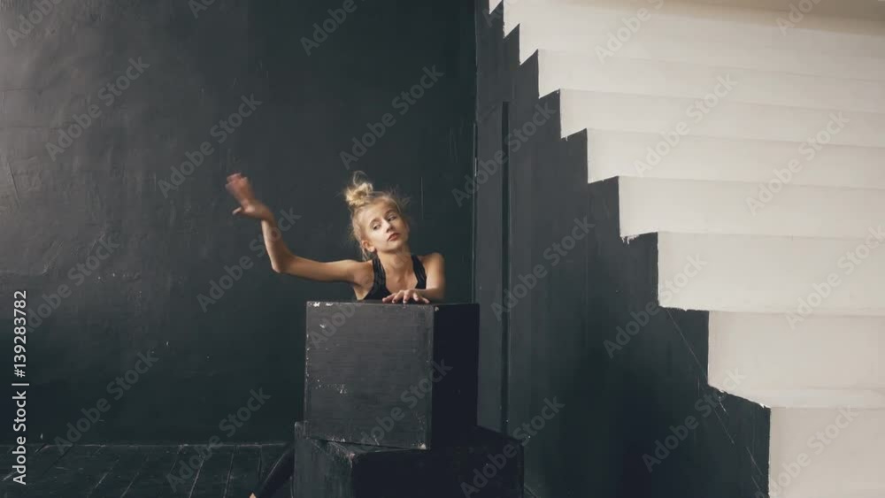 Modern beautiful teenage girl dancer perfomance contemporary dance in ballroom indoors Modern beautiful teenage girl dancer perfomance contemporary dance in ballroom indoors