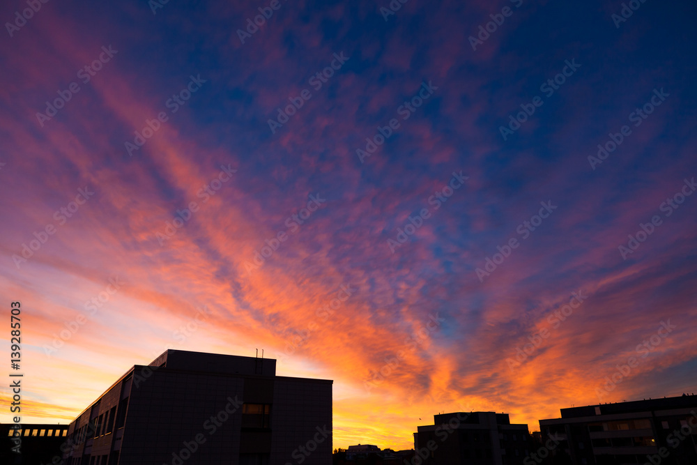 Fiery vivid sunset sky clouds Fiery vivid sunset sky clouds