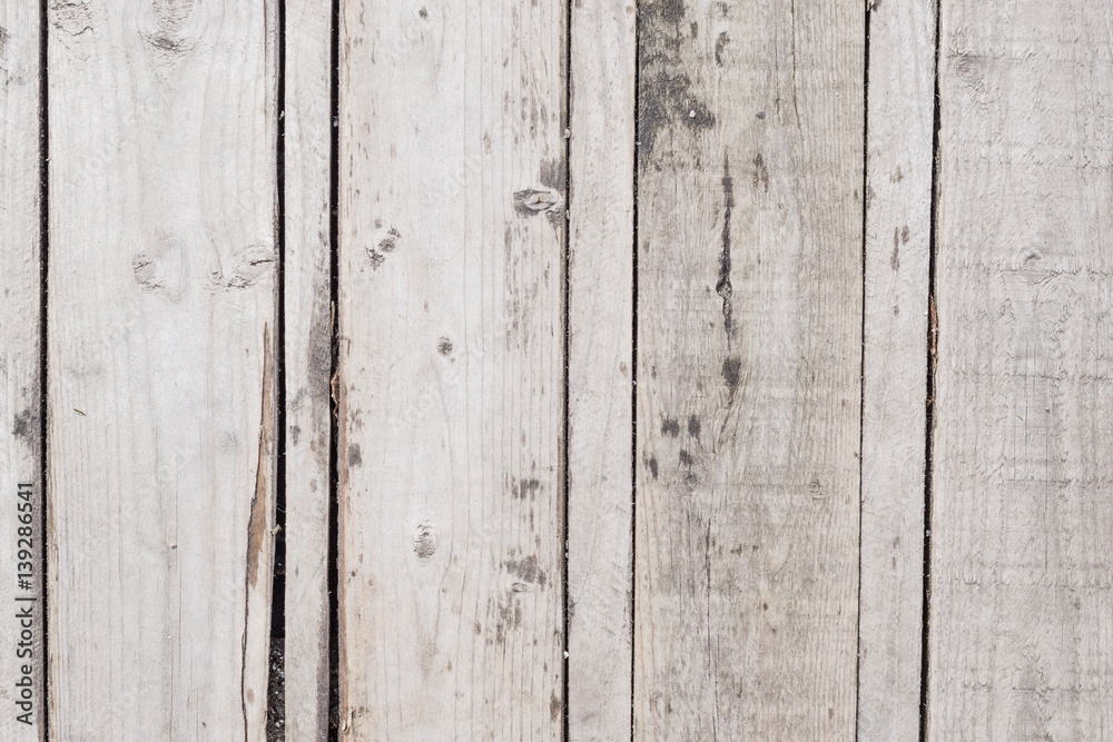 Background old vertical gray wooden planks. Close up old wood texture Background old vertical gray wooden planks. Close up old wood texture