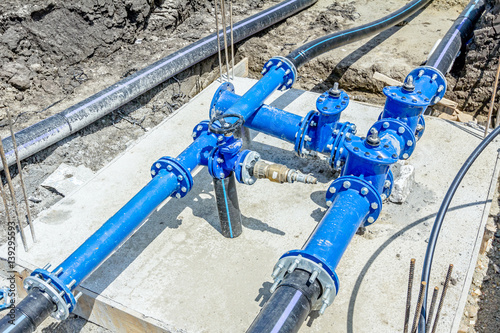 Fotografija Industrial water pipes with valve, stopcock system