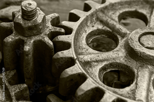 rusty metallic gears and cogwheels of old industrial machine