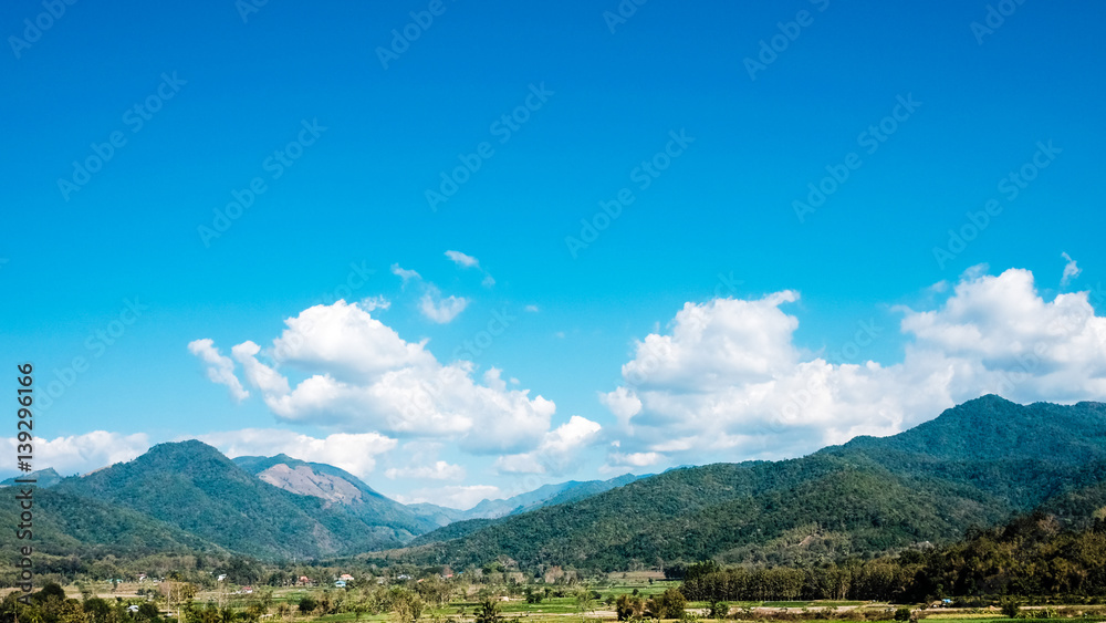 Town in north of Thailand. Mountain and blue sky landscape photo