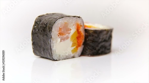 Kandzu maki sushi roll with flying fish roe, shrimp and fresh paprika Japan food photo