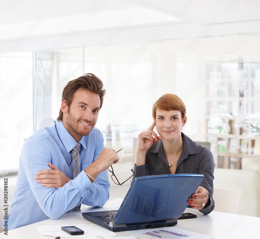 Young businesspeople working at office Young businesspeople working at office