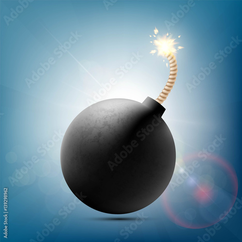 Round metal bomb with a burning fuse.