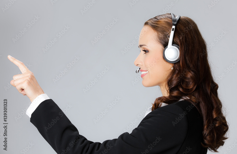 Support phone operator pointing, over grey Support phone operator pointing, over grey