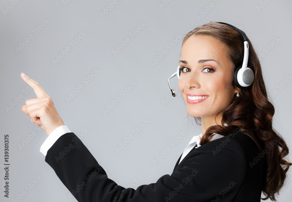 Support phone operator pointing, over grey Support phone operator pointing, over grey
