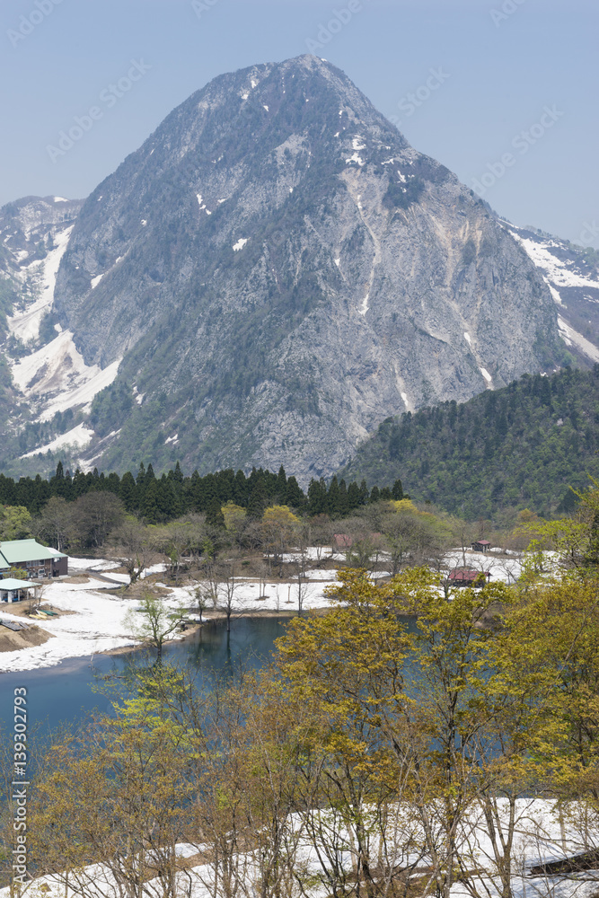 芽吹きの高浪の池と明星山stock Photo Adobe Stock