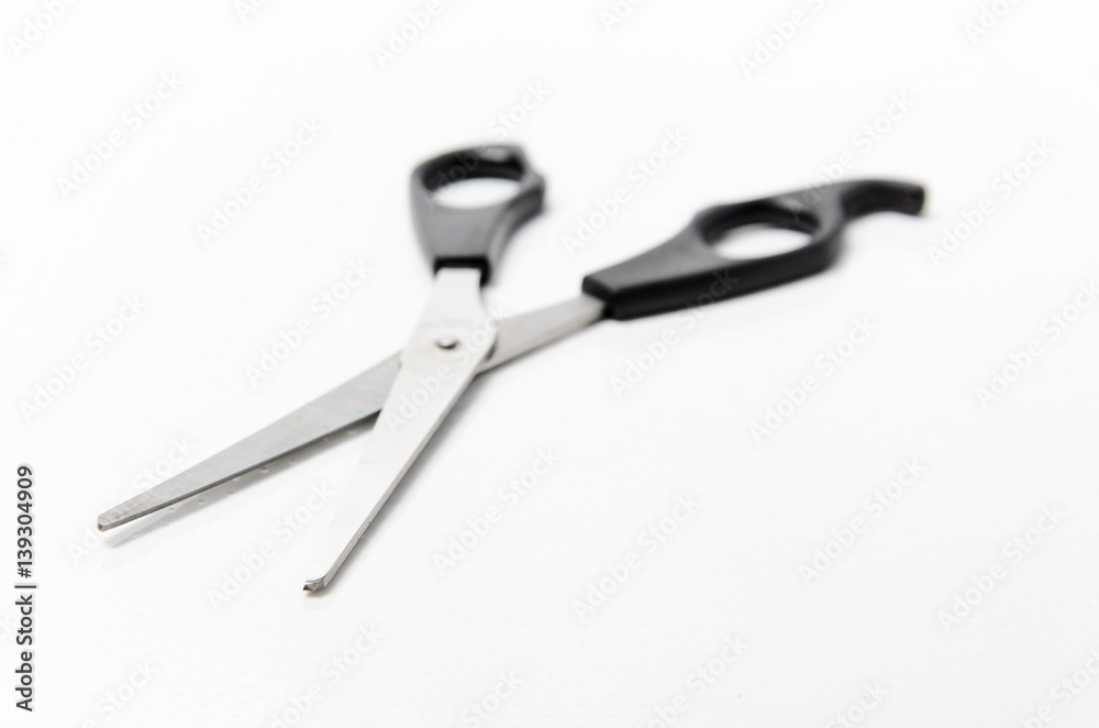 Scissors on white background with copy space Scissors on white background with copy space