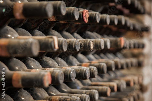 Old bottles of wine in old cellar