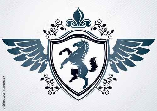 Vector retro insignia design decorated using vintage elements like horse and eagle wings
