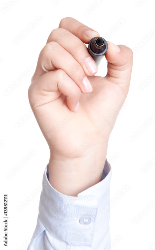 Hand writing on copy space. Beautiful female hand holding black marker pen . Brightly lit with backlight and isolated on white background. Hand writing on copy space. Beautiful female hand holding black marker pen . Brightly lit with backlight and isolated on white background.