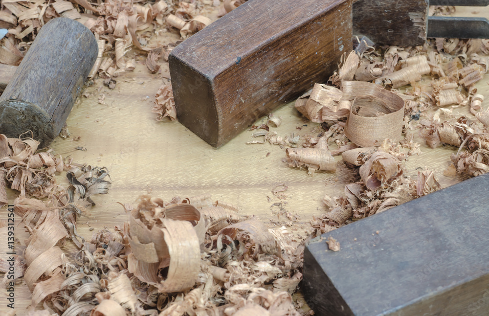 The carpenter was working furniture wood in studio , Soft-focus image The carpenter was working furniture wood in studio , Soft-focus image
