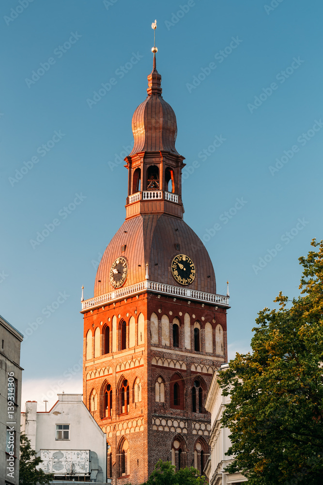 Clock On Tower Of Riga Dome Cathedral In Riga, Latvia. Sunny