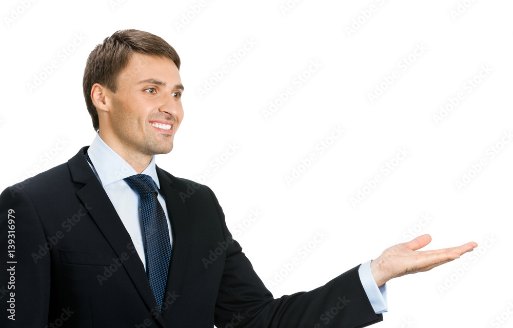 businessman showing something or copyspase businessman showing something or copyspase