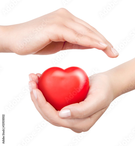 hands holding sweet little heart isolated on white background.