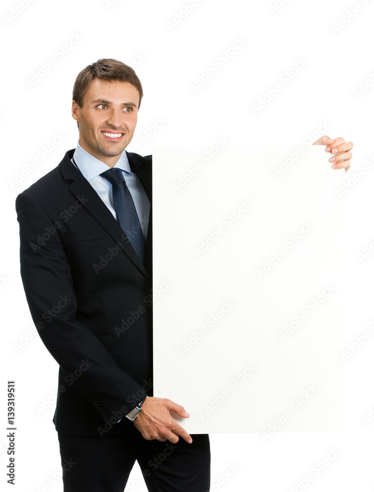 businessman showing signboard with copyspase businessman showing signboard with copyspase