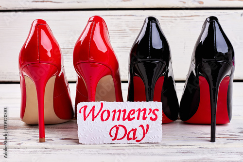 Black and red women's shoes. Stylish gift for Women's day.