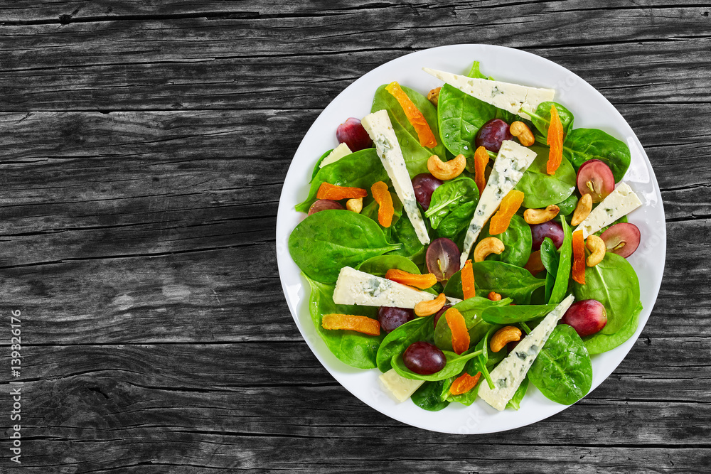 grape, blue cheese, spinach, dried apricots and cashew healthy salad grape, blue cheese, spinach, dried apricots and cashew healthy salad