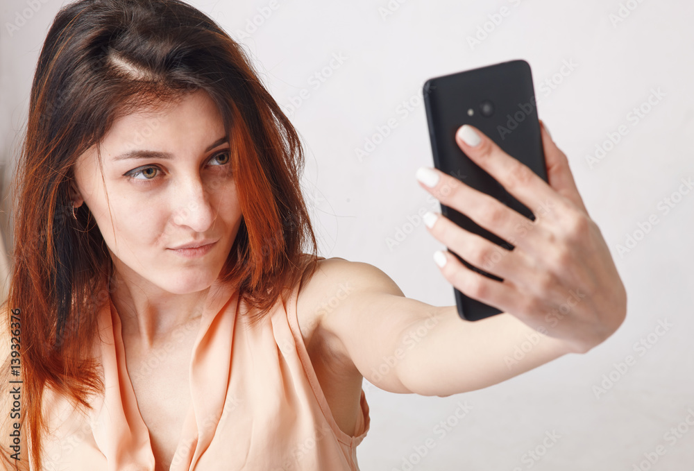 Woman taking selfie