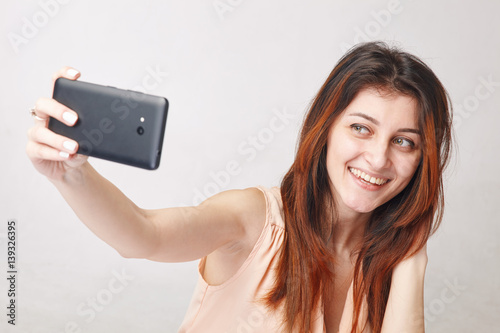 Woman taking selfie