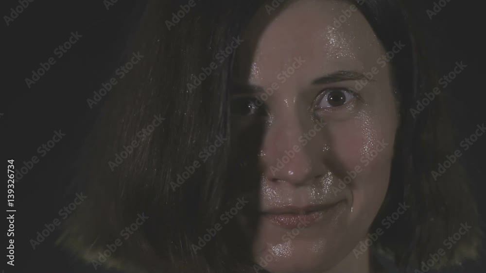 Portrait of tired brunette having rest in short break after workout, slow motion Portrait of tired brunette having rest in short break after workout, slow motion