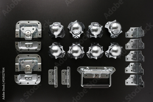 Flight Case Metallic Hardware on Black Background