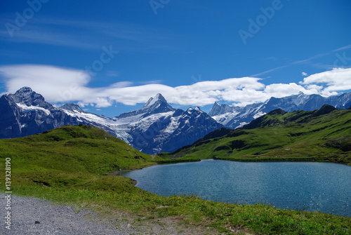 Fototapeta Naklejka Na Ścianę i Meble -  Sunny day view to the mountains Bachalpsee lake. Mannlichen (Jungfrau region, Bern, Switzerland)