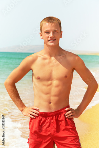 man standing on the beach