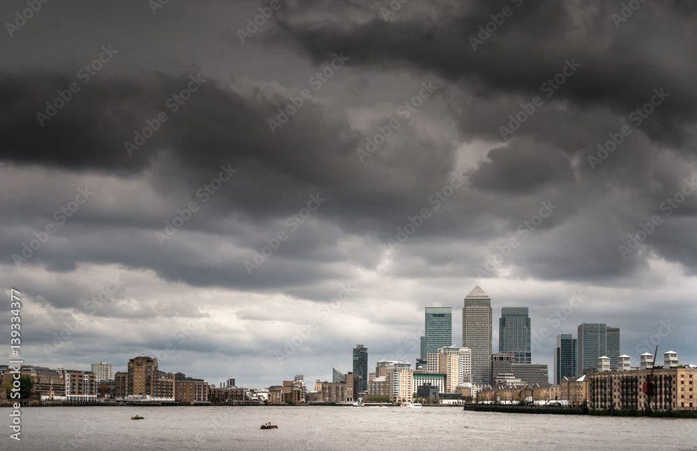 Grey clouds hang over Canary wharf. London