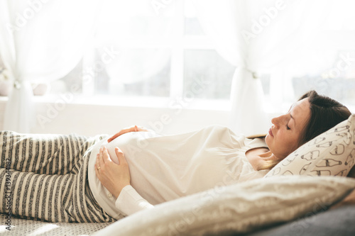 Pregnant woman in bed