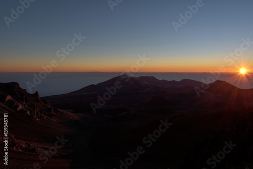 Sunrise breaks at Mount Haleakala  Maui