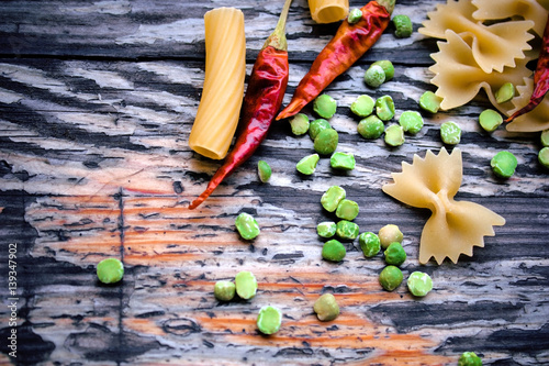 Pasta with dried green peas, red hot chili peppers 
 photo