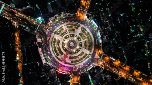 Road roundabout with car lots Wongwian Yai in Bangkok Thailand. street large beautiful downtown at evening light.  Aerial view   Top view  cityscape  Rush hour traffic jam