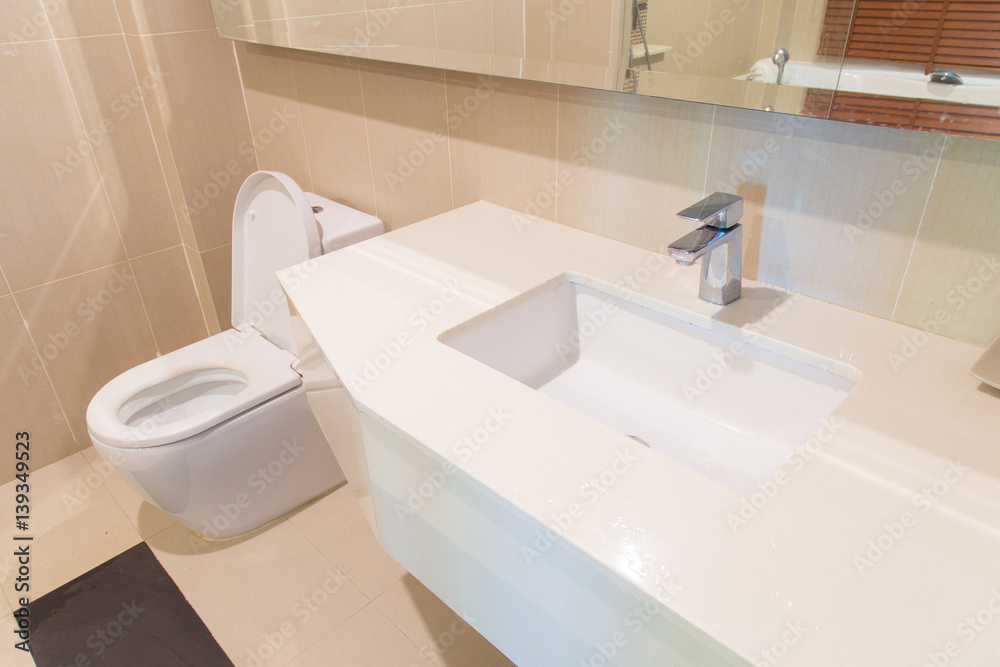 Modern Bathroom interior with orange tone. Modern Bathroom interior with orange tone.