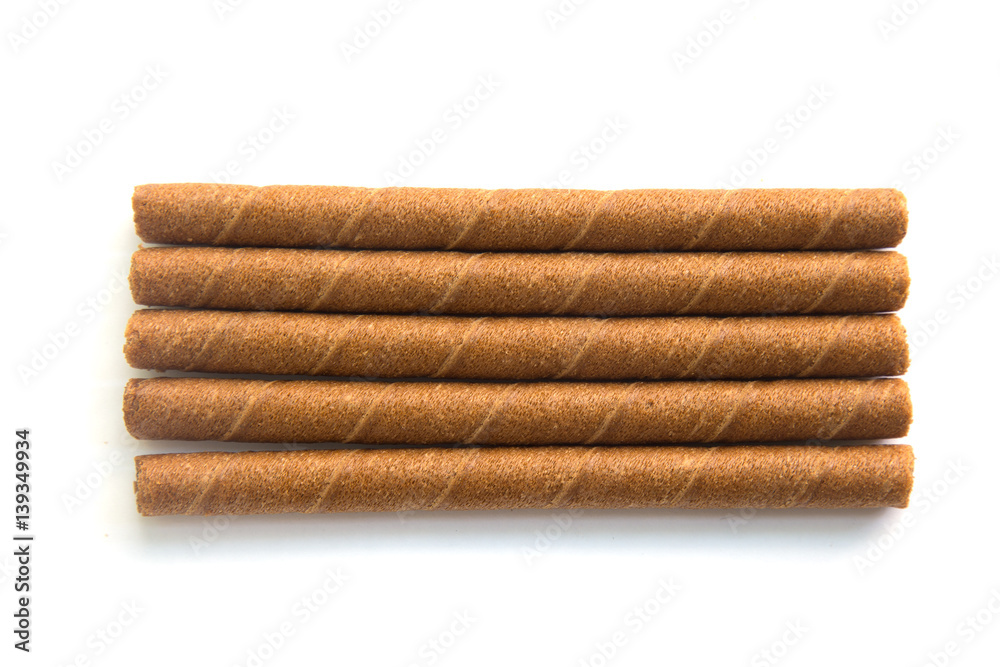 wafer rolls with chocolate isolated on white background. wafer rolls with chocolate isolated on white background.