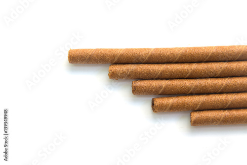 wafer rolls with chocolate isolated on white background.