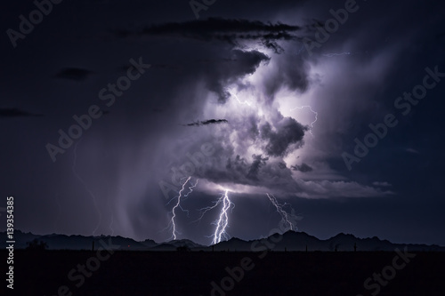Thunderstorm lightning bolts and cumulonimbus cloud