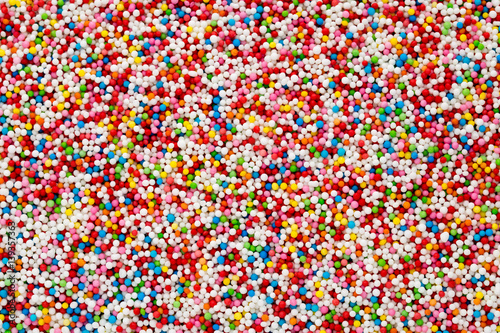 Multicoloured sweet sugar balls. Small ball pattern.
