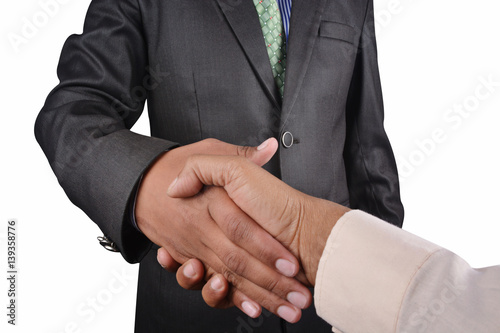 Business man shaking hand in black suit isolated on white background