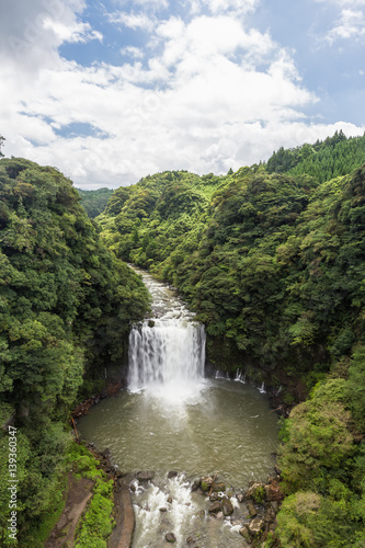 Kamikawa Otaki Waterfall and green forest in Kagoshima, Kyushu, Japan