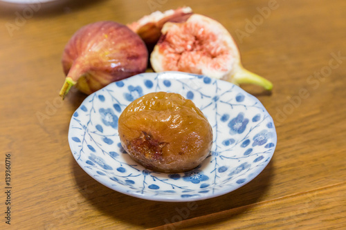 Homemade sweeten preserved fig and fresh figs. photo