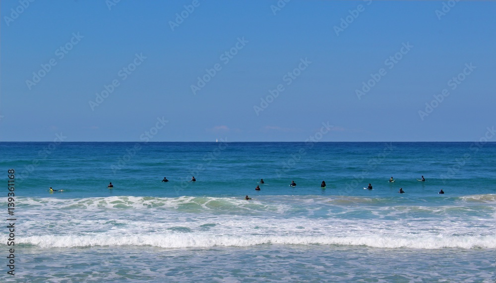 Surfers in Israel waiting for the waves